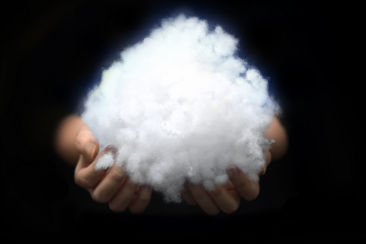 Hatch export quality soft and fluffy environmental wool product with hands holding wool and text describing product features.