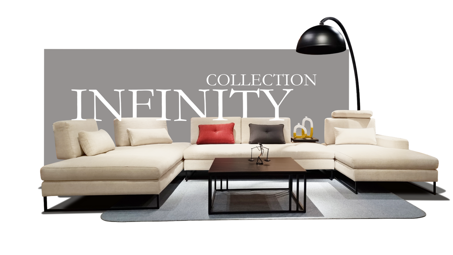 Modern sectional sofa with a coffee table and decorative items, branded 'Collection INFINITY'.